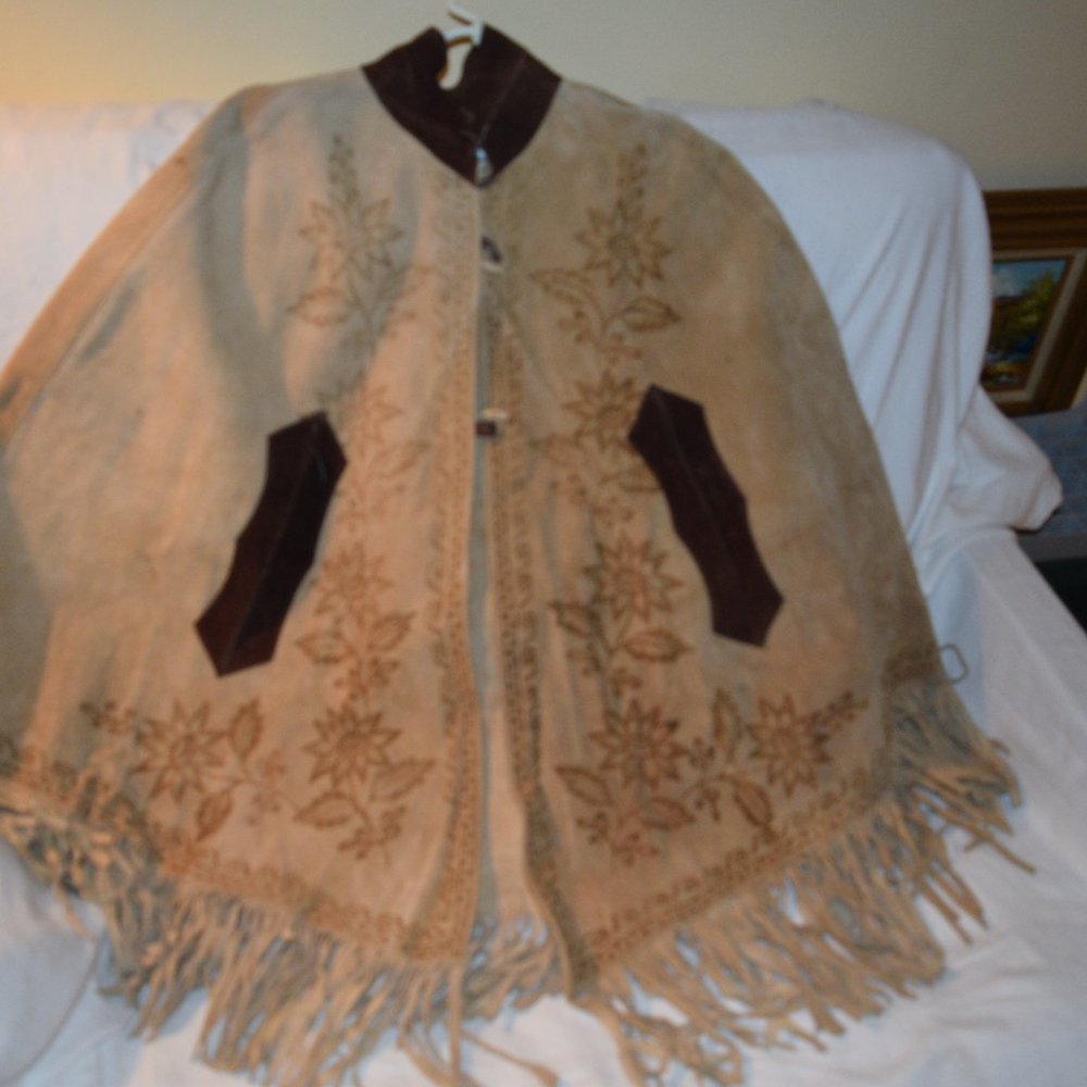 womens  leather cape made in Mexico